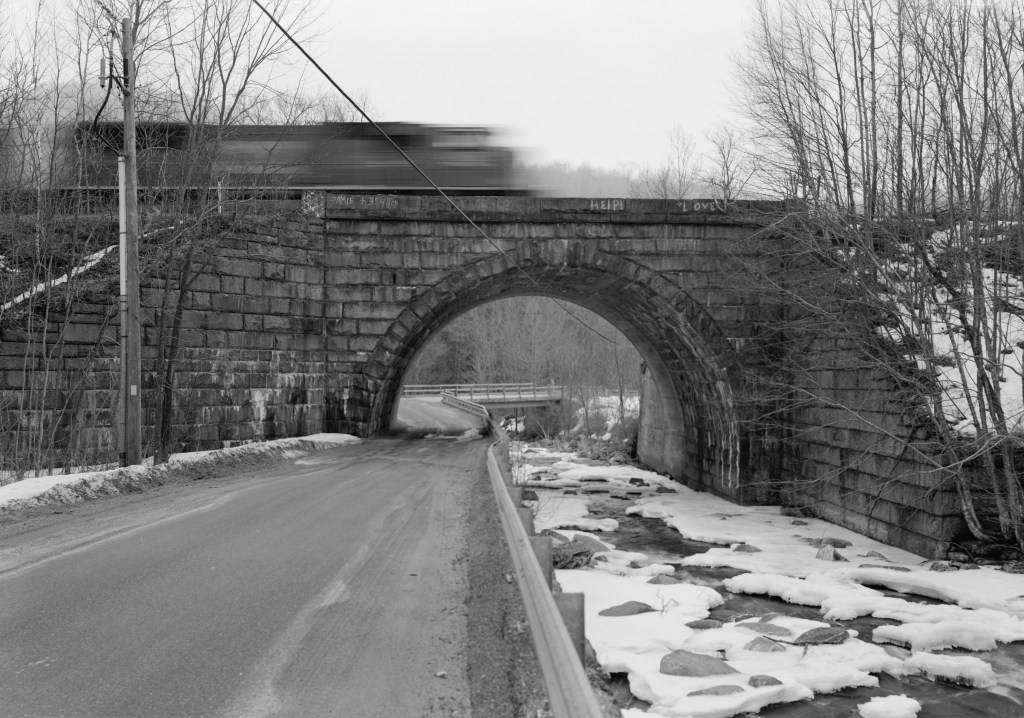 STONE SIDE ELEVATION LOOKING SOUTH, WEST BOUND TRAIN LOCOMOTIVE IN MOTION - Bancroft Bridge, Middlefield, Hampshire County, MA
